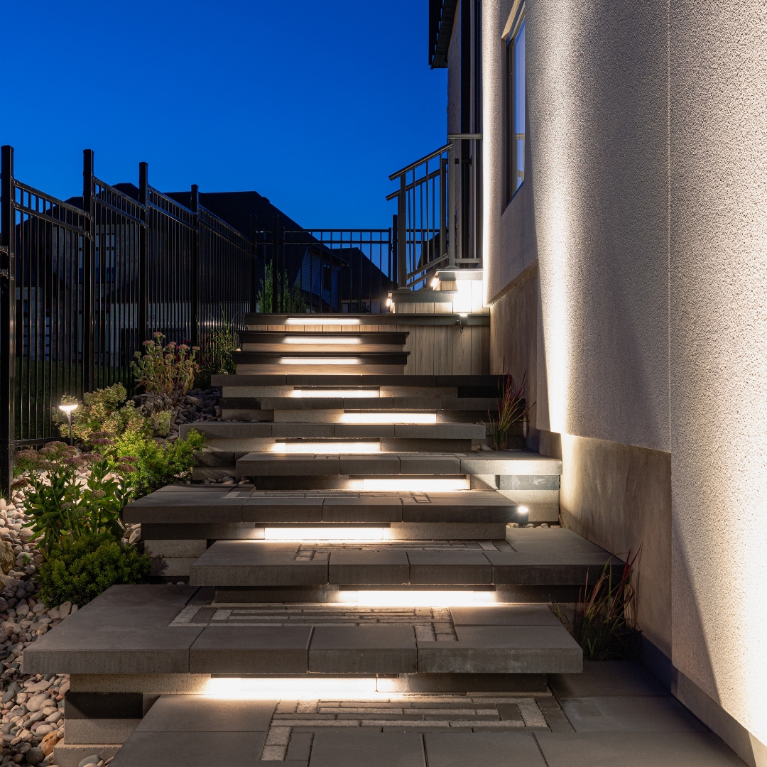 Concealed undercap lighting integrated into hardscape